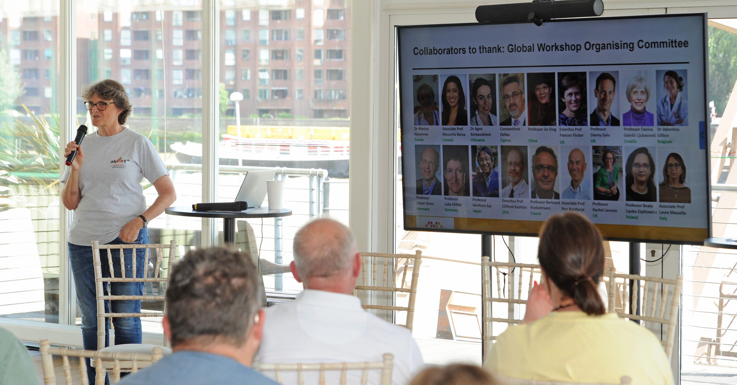 Susie Gear introducing the collaborators of the Global Workshop Organising Committee.